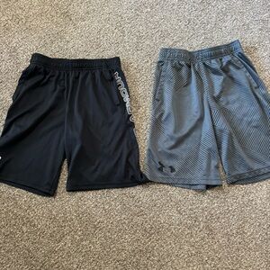 Two pair of boys Under Armour shorts in size youth large